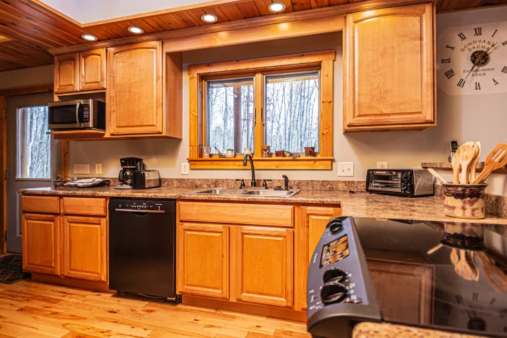 Premium Photo  A kitchen with orange appliances and a clock on